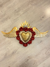 Double flamed winged heart with flowers and candelabra