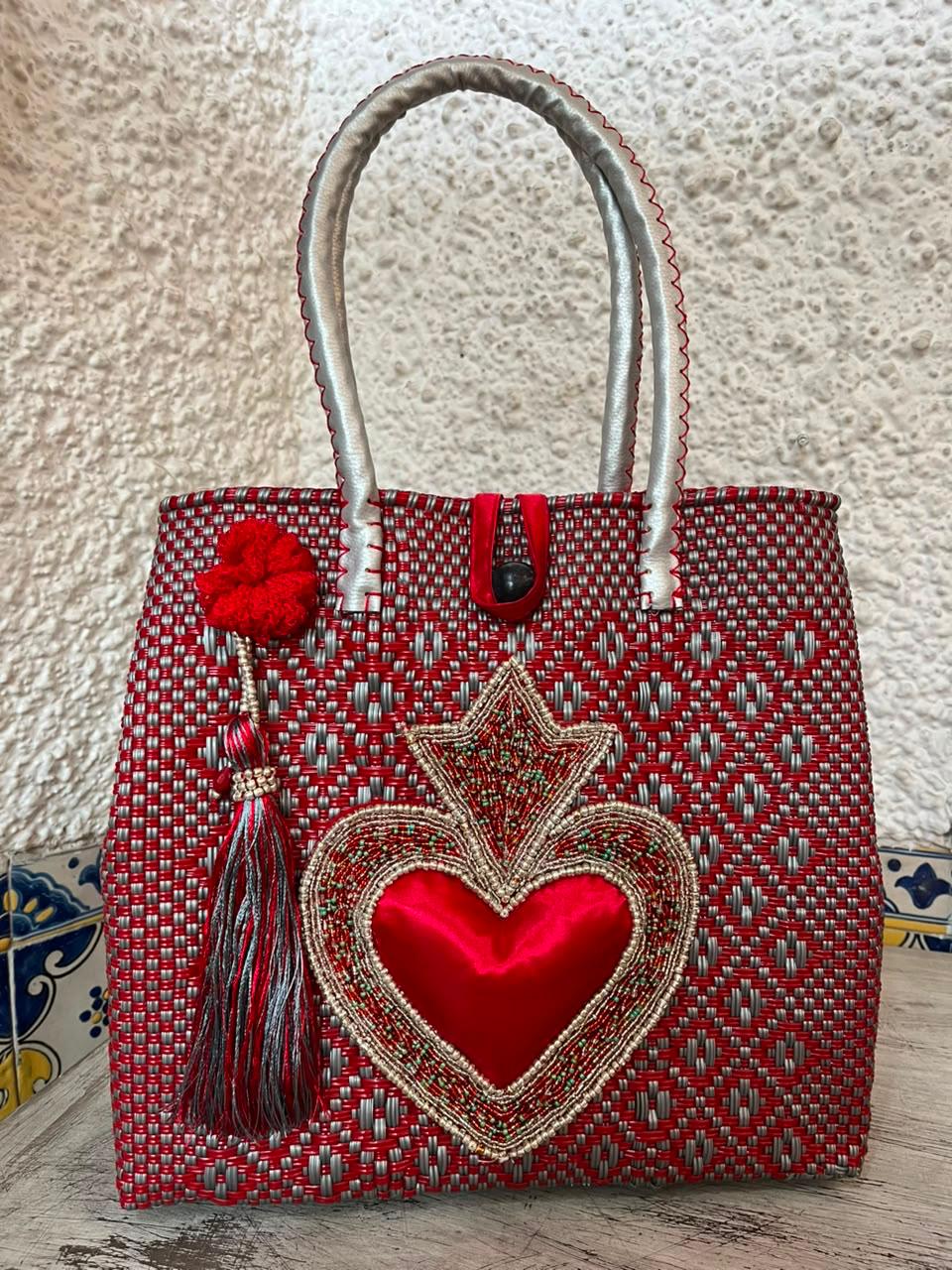 Medium heart milagro artisan bag with flower pompom