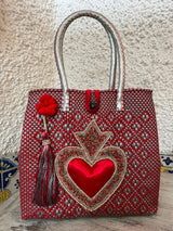 Medium heart milagro artisan bag with flower pompom