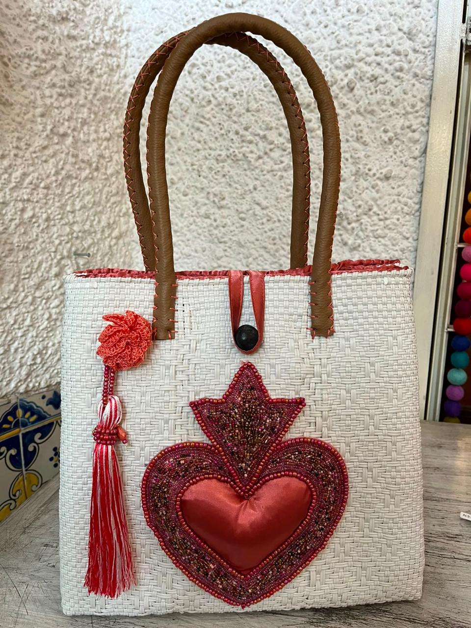 Medium heart milagro artisan bag with flower pompom